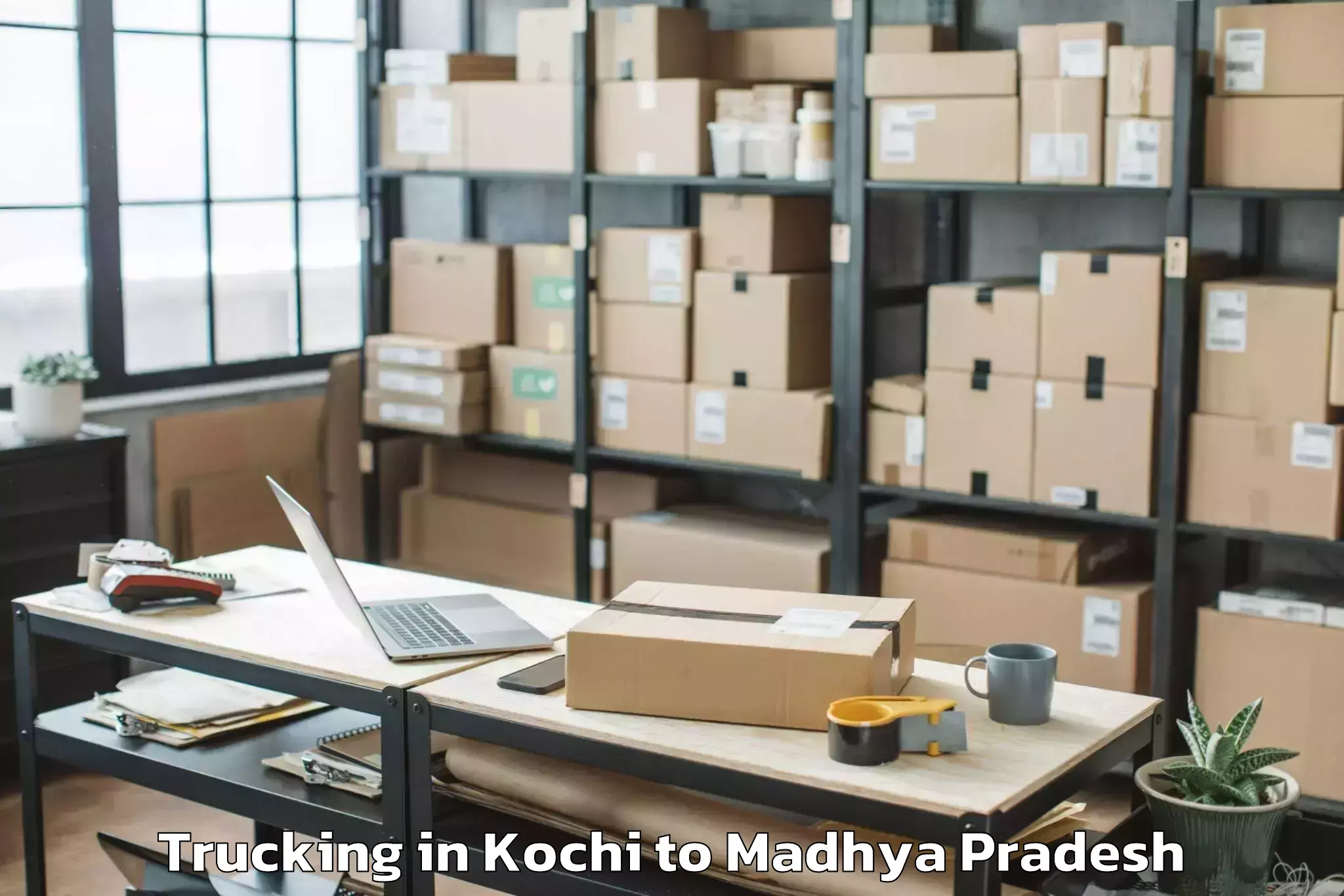 Book Kochi to Betma Trucking Online